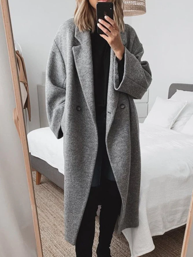 Elegant women's classic tailored long overcoat for autumn and winter. Chic, warm & versatile outerwear.