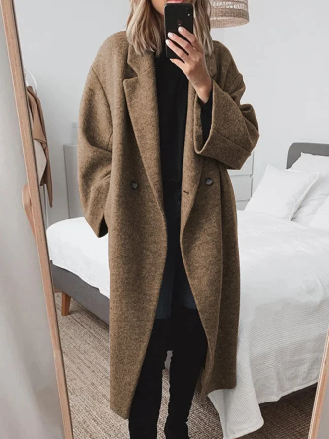 Classic women's blue tailored long overcoat, elegant winter & autumn outerwear. Versatile ladies fashion.