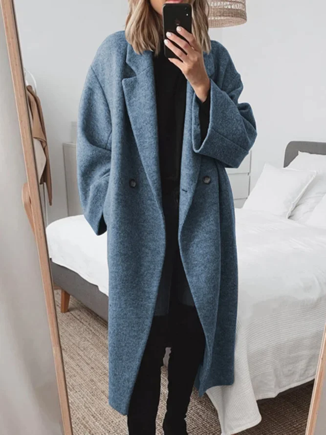 Warm women's long tailored overcoat, classic style for elegant autumn & winter fashion outerwear.