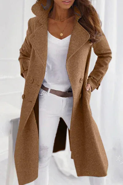 Stylish women's long winter coat, featuring a classic design and warm fabric for elegant cold-weather outerwear.