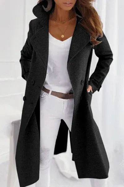 Fashionable women's elegant winter coat, offering warm protection in a stylish long classic outerwear design.