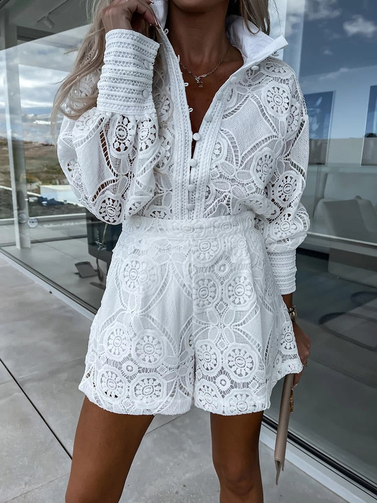 Elegant women's co-ord set: long sleeve blouse & high-waist shorts. Perfect for summer garden parties.