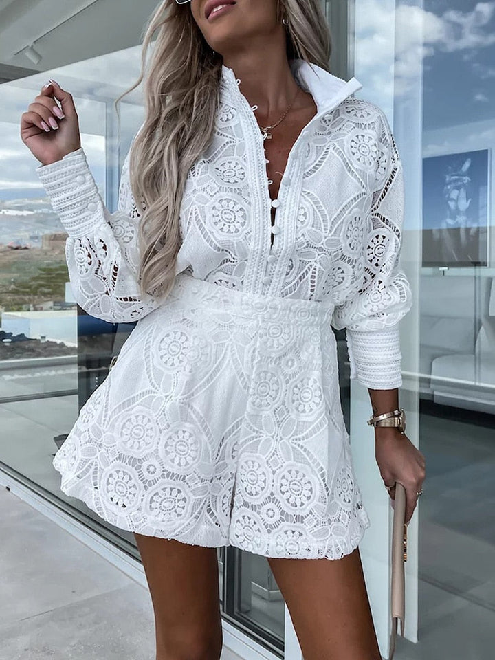 Sophisticated women's blouse and shorts co-ord set, featuring high-waist. Great for elegant events.