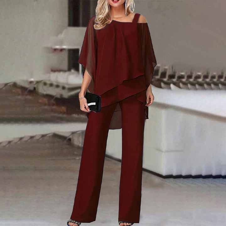 Flowy cold shoulder jumpsuit for women, comfortable and elegant, ideal for a chic everyday or evening look.