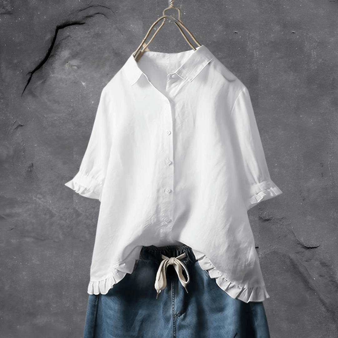 Plus size women's button-front collared top, featuring short sleeves and a fashionable ruffled hem design.