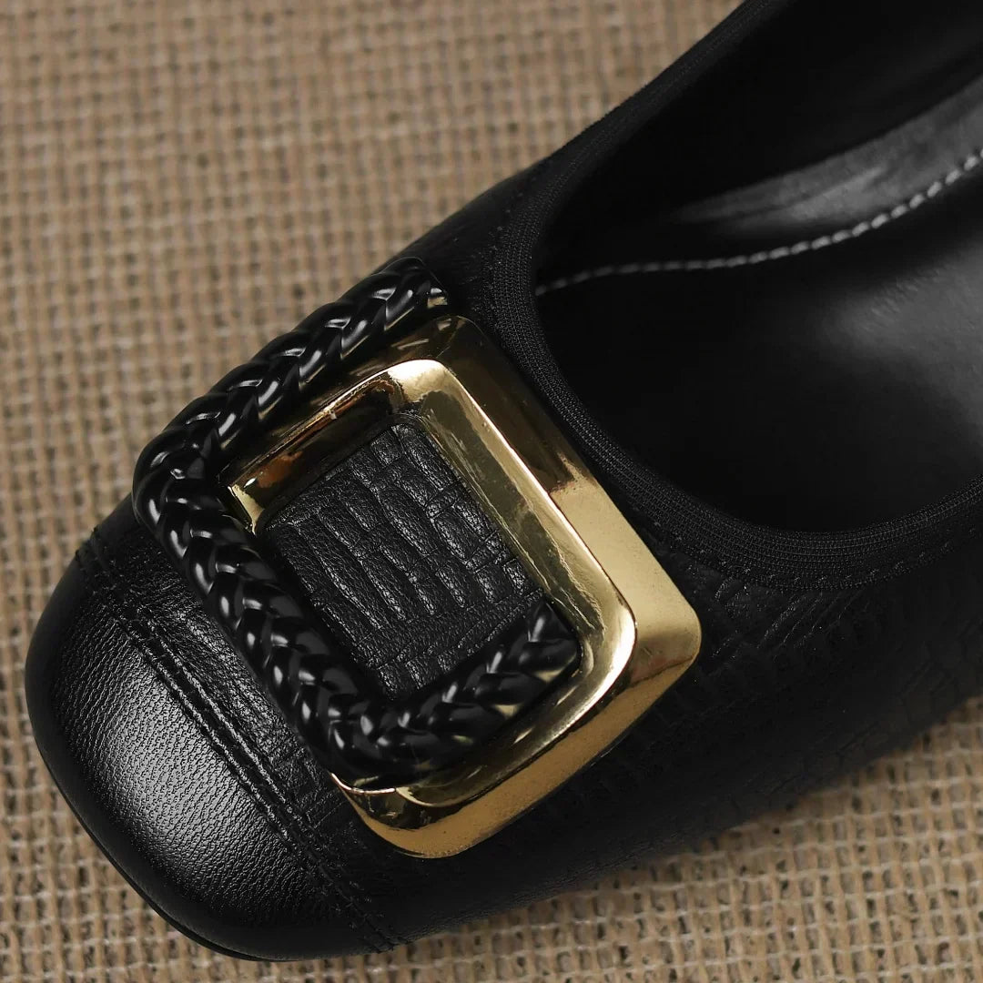 Fashionable women's elegant comfort heels featuring a low square heel, square toe, and stylish gold buckle detail.