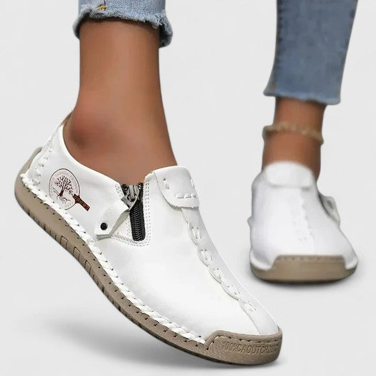 Stylish brown women's walking shoes. Elegant flats designed for comfort, posture correction & everyday support.