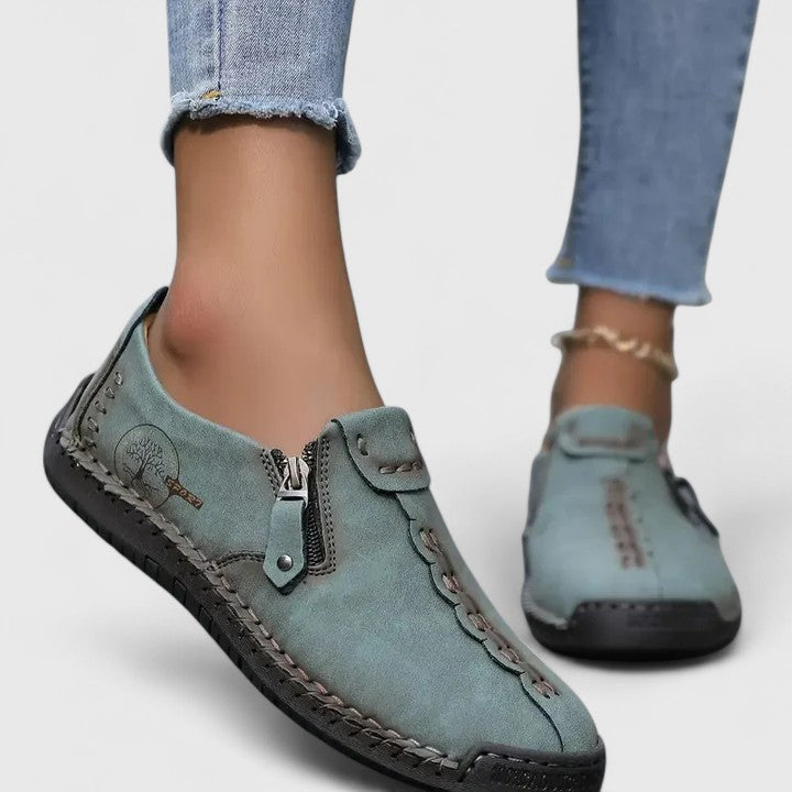 White elegant women's comfort walking shoes with superior foot support, ideal for pain relief & casual wear.