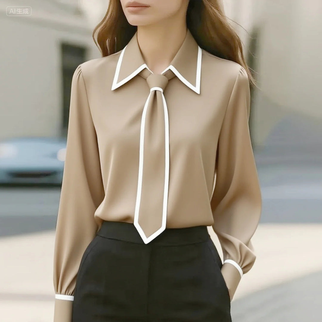 Modern women's long sleeve top featuring a chic contrast tie neck and fashionable oversized collar.