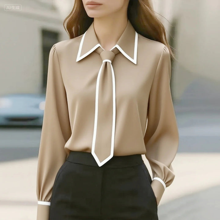 Modern women's long sleeve top featuring a chic contrast tie neck and fashionable oversized collar.