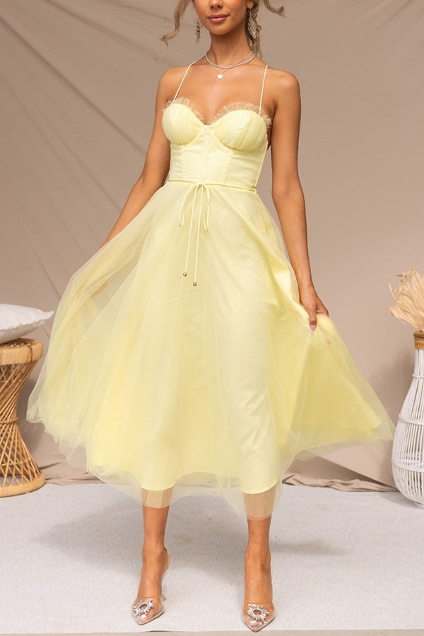 Sophisticated women's evening dress, a fitted corset and airy tulle midi skirt.