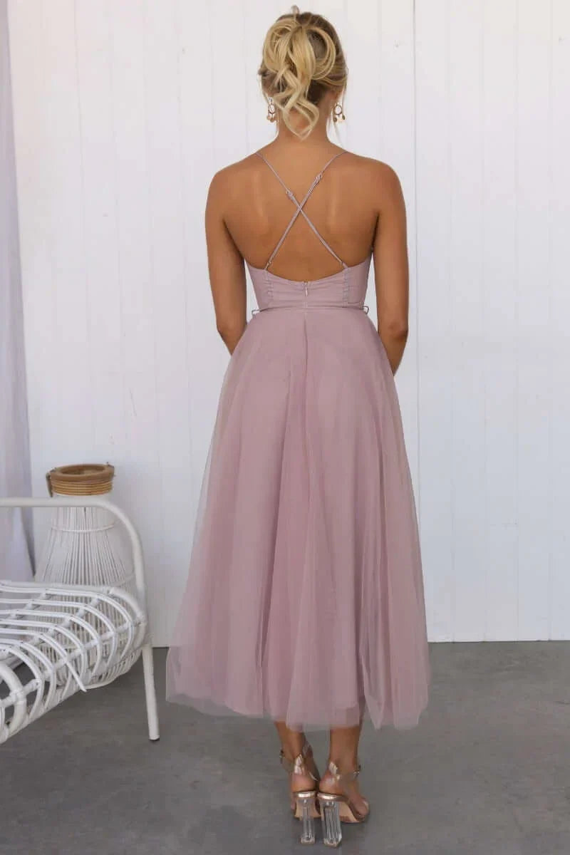 Graceful women's party dress with a fitted corset bodice and airy tulle bottom.