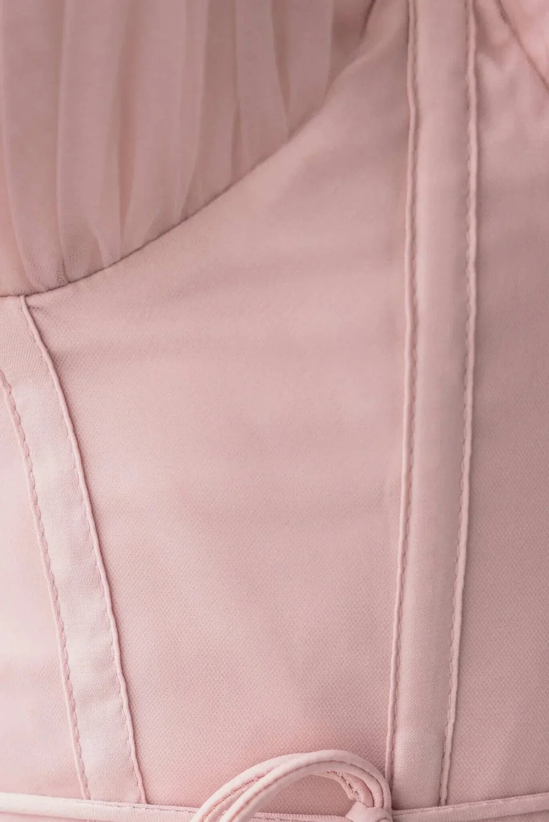Stylish women's cocktail dress, a corset top paired with a luxurious tulle midi skirt.