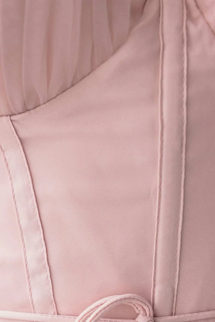 Stylish women's cocktail dress, a corset top paired with a luxurious tulle midi skirt.