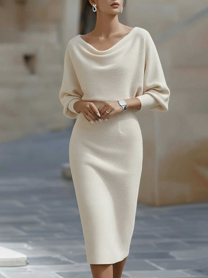 Women's sophisticated batwing midi dress, featuring a graceful cowl neck, perfect as an elegant wedding guest dress.