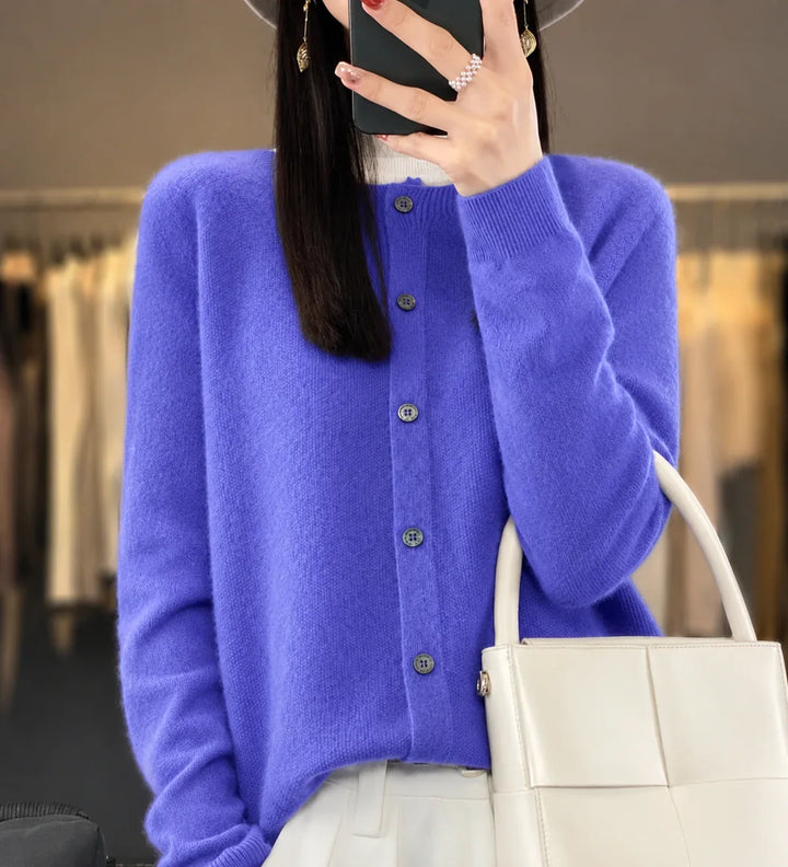 Elegant women's crew-neck cardigan with button front, perfect for a casual yet sophisticated layered look.