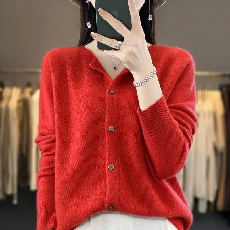 Elegant women's cardigan with a classic crew neck and button-front closure. Comfortable long-sleeve top.