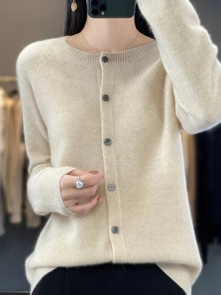 Fashionable women's elegant button-front cardigan. Comfortable crew-neck top ideal for casual wear.
