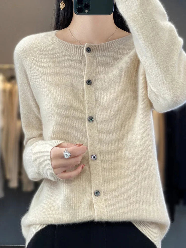Fashionable women's elegant button-front cardigan. Comfortable crew-neck top ideal for casual wear.