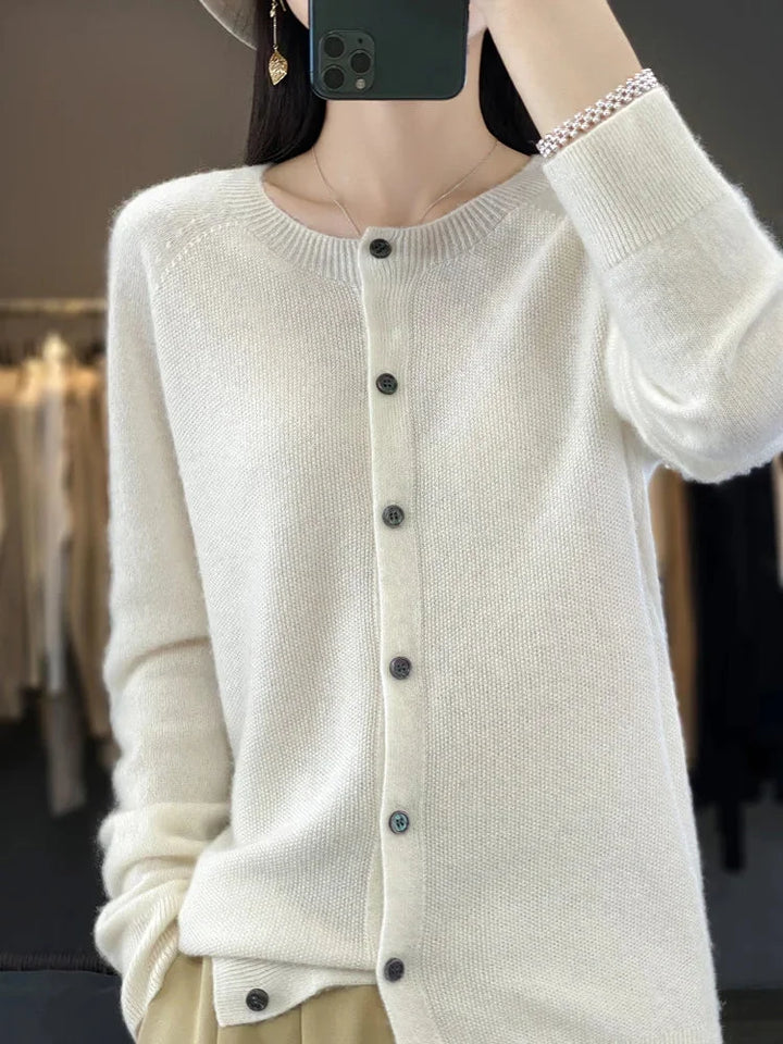 Soft knit women's crew-neck cardigan. Stylish button-up sweater, an all-season layering piece.