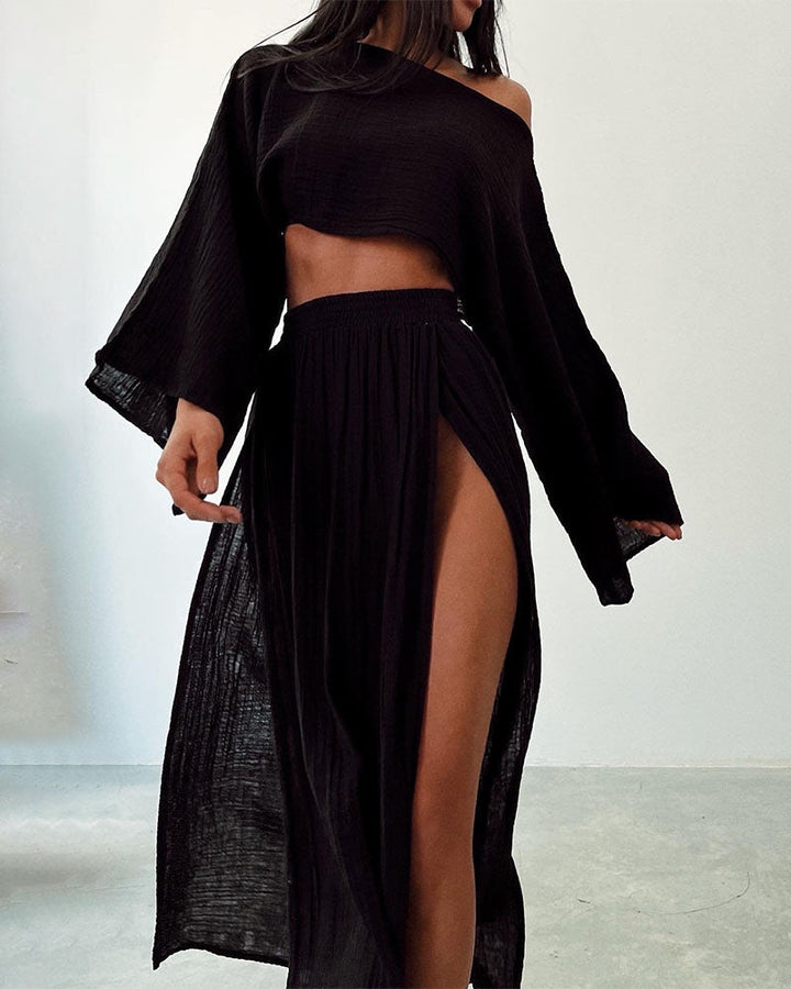 Women's elegant crop top & side split maxi skirt set, showcasing the flowy fabric and stylish design.