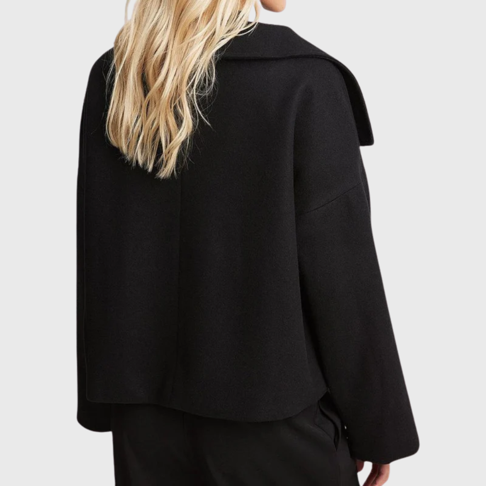 Sophisticated women's cropped double-breasted winter coat, a stylish piece of fall outerwear.