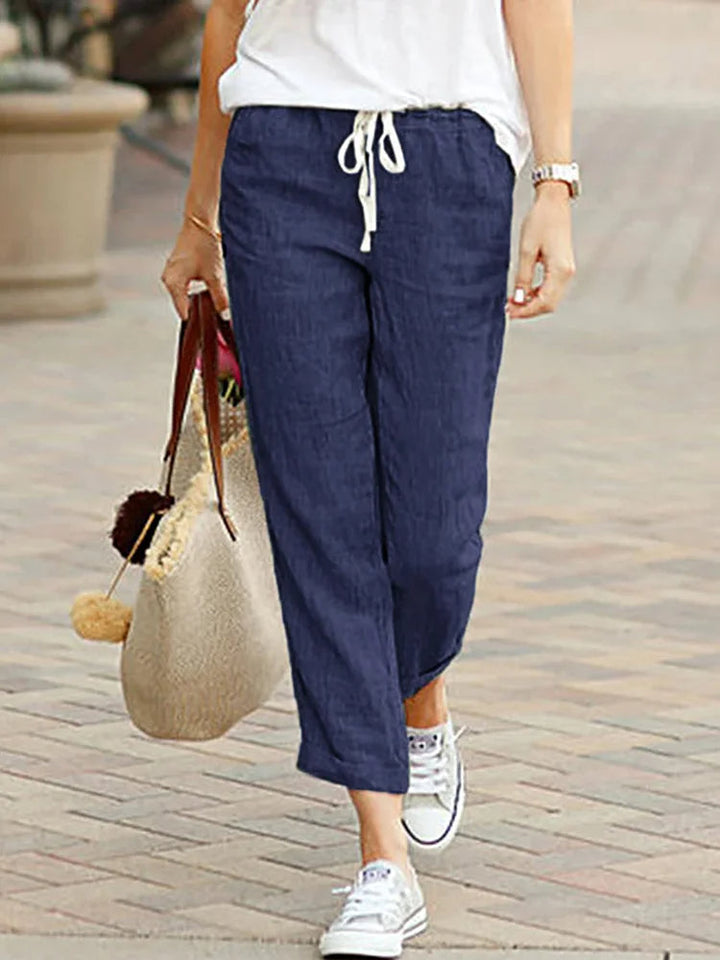 Women's elegant cropped trousers for workwear or casual outfits. Comfortable polyester loose-fit pants, all-season style.