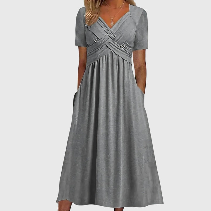 Versatile women's short-sleeve midi dress with tummy control, a chic cross-front, and A-line silhouette.