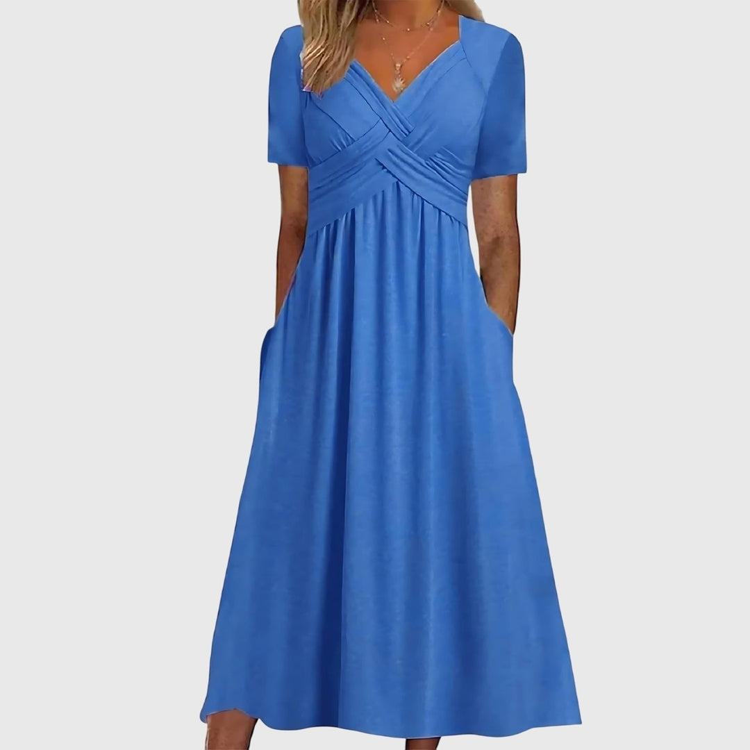 Women's cross-front A-line midi dress. Features tummy control, short sleeves, and flattering fit for all seasons.