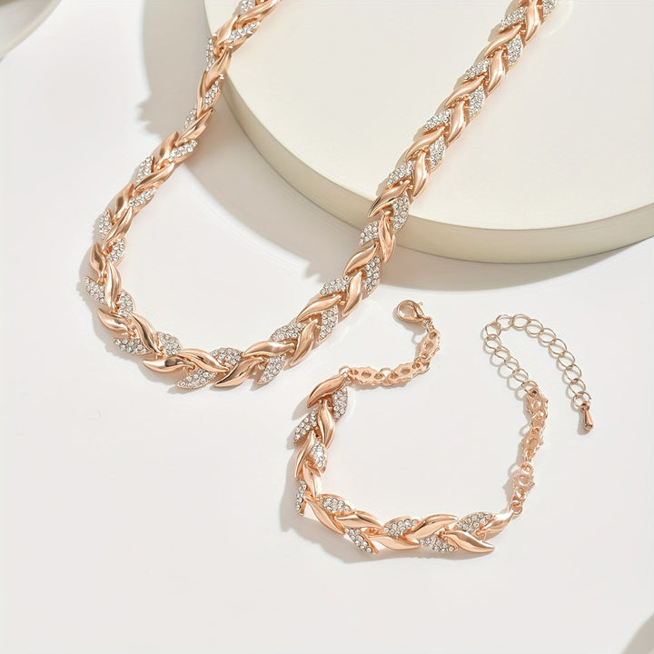 Beautiful crystal leaf jewelry set, necklace & bracelet, an elegant gift for women. Sparkling fashion accessory.