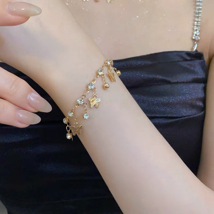 Delicate crystal leaf pendant necklace & bracelet, an elegant women's jewelry set for special occasions or gifts.