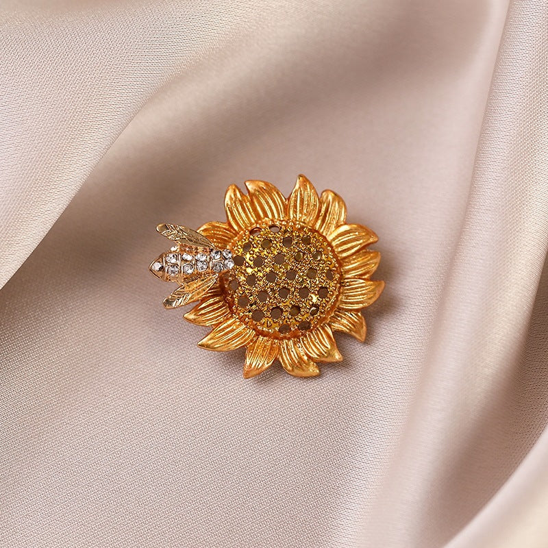 Elegant women's crystal sunflower brooch pin, a sparkling floral design accessory.