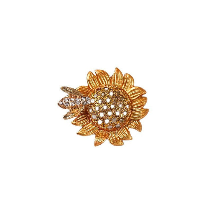 Vibrant crystal sunflower fashion pin, a sparkling floral design accessory for women.