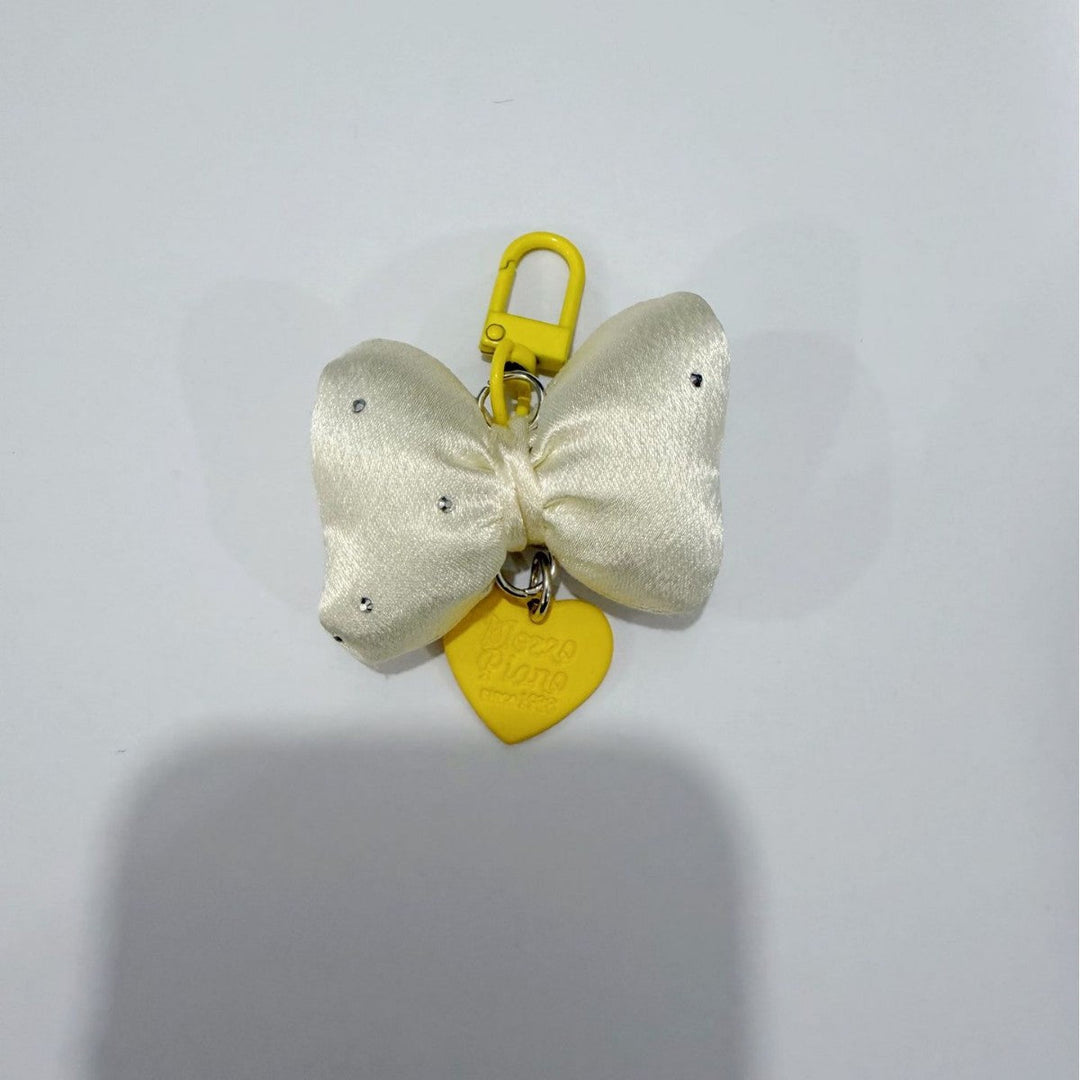Elegant women's decorative bow keychain in a vibrant color, perfect as a stylish bag charm accessory.