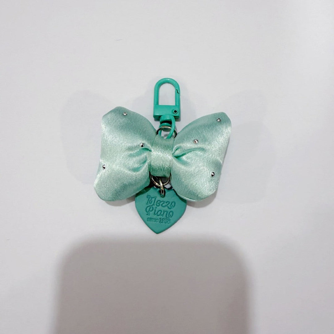 Women's elegant colorful bow keychain, a stylish decorative accessory and perfect bag charm gift for her.