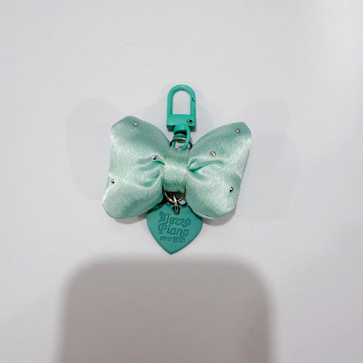 Women's elegant colorful bow keychain, a stylish decorative accessory and perfect bag charm gift for her.