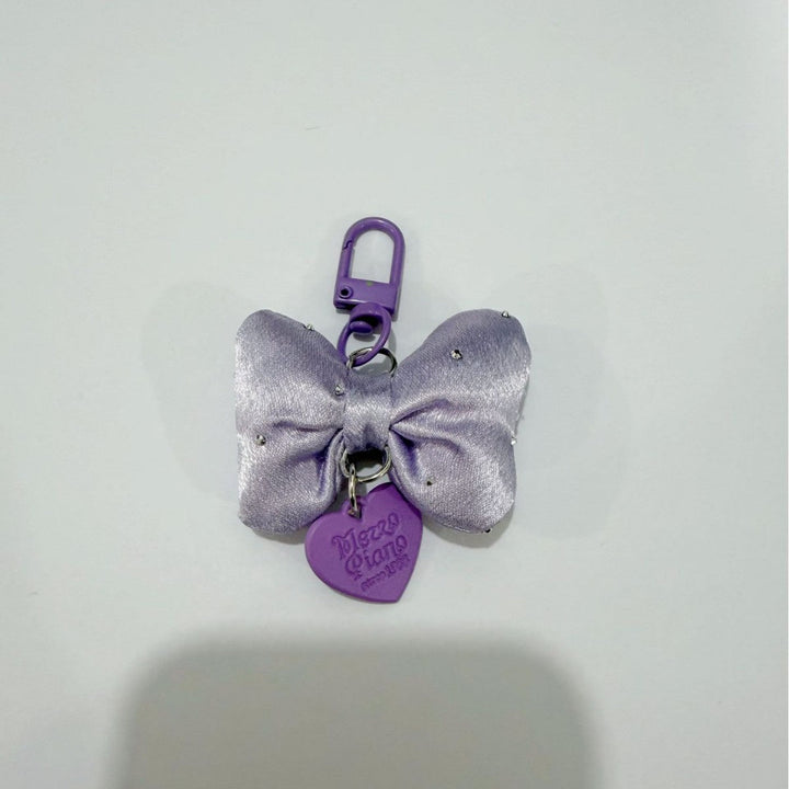 Elegant women's bow keychain, a perfect decorative accessory and thoughtful gift for her bag or keys.