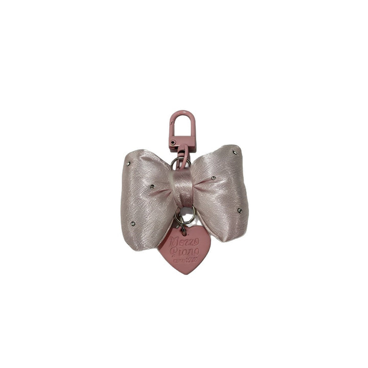 Stylish large fabric bow keychain for women, an elegant decorative accessory for bags or keys.