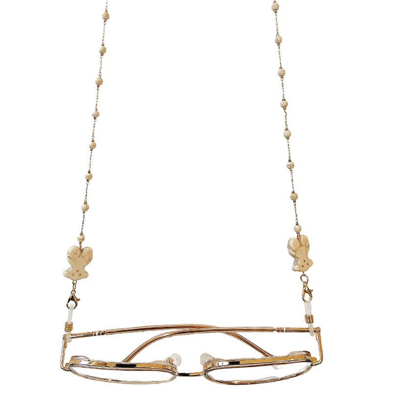 Delicate women's elegant diffuser bead drop earrings. Handcrafted statement accessory, ideal gift.