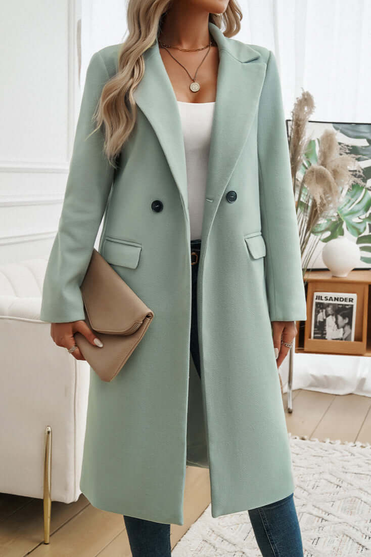Women's elegant long coat, double-breasted, perfect for sophisticated fall outerwear.
