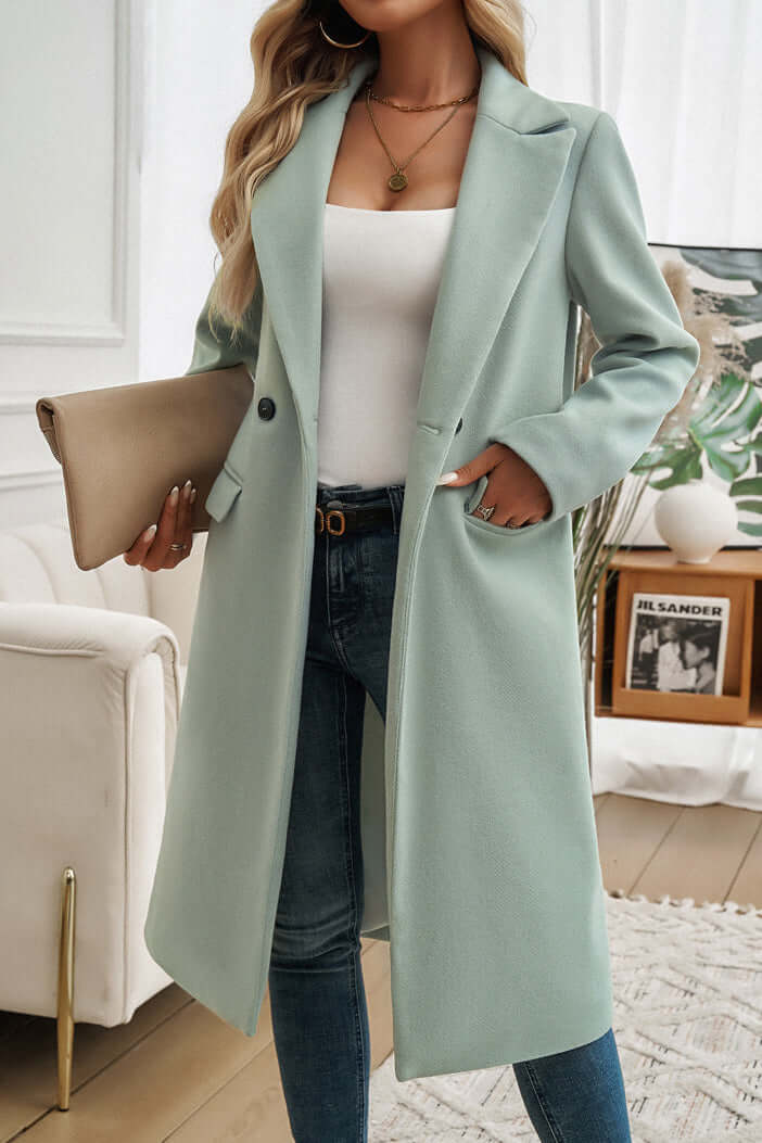 Timeless women's double-breasted long coat, ideal for elegant winter fashion & chic style.
