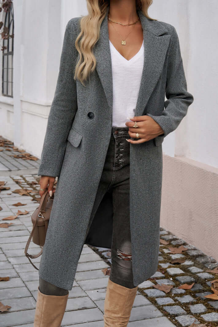 Chic women's long double-breasted coat, perfect for timeless elegant style.
