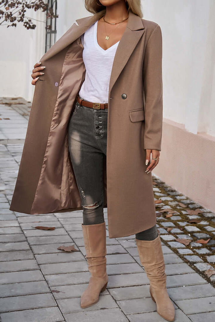 Classic women's long double-breasted coat, perfect for sophisticated fall & winter fashion.