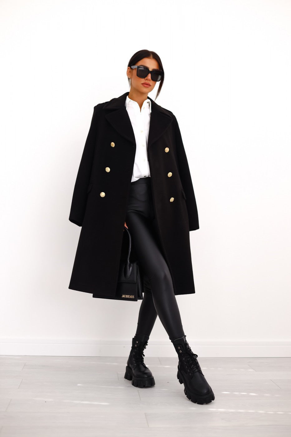 Elegant women's double-breasted long coat for classic fall & winter fashion.