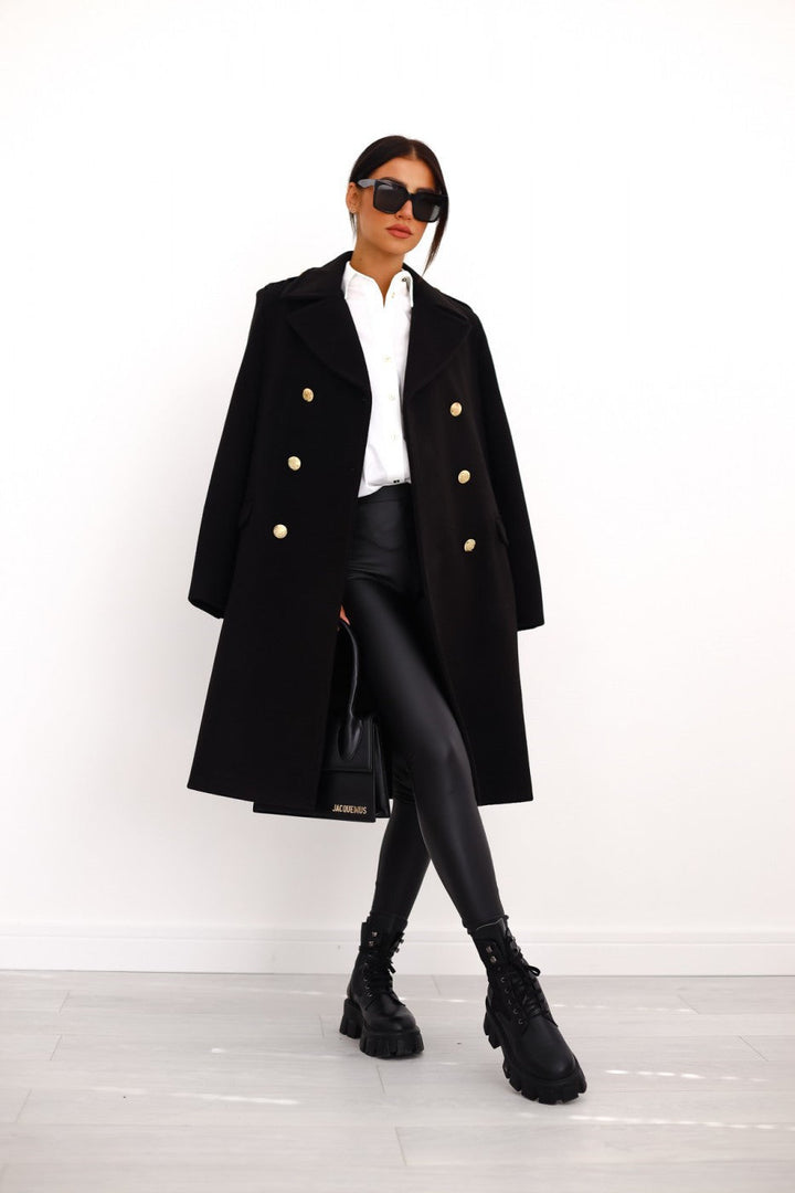 Elegant women's double-breasted long coat for classic fall & winter fashion.
