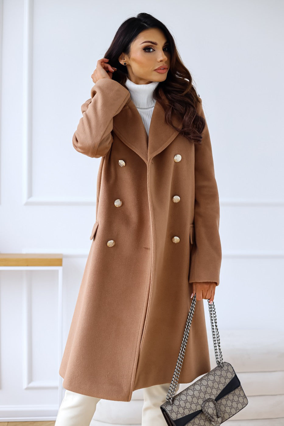 Ladies' elegant long coat, double-breasted for a sophisticated look in fall & winter.