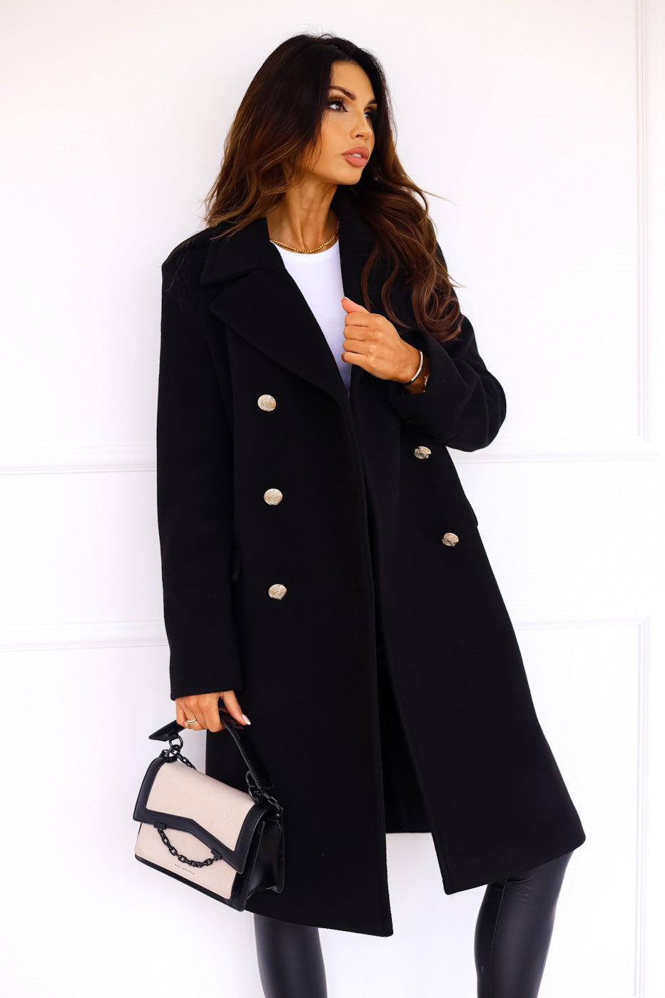 Classic double-breasted women's coat, perfect for elegant winter & fall fashion.