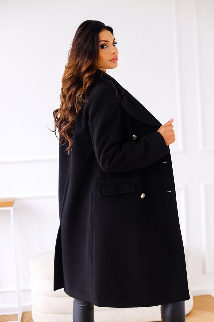 Women's elegant long coat, double-breasted with timeless classic style.