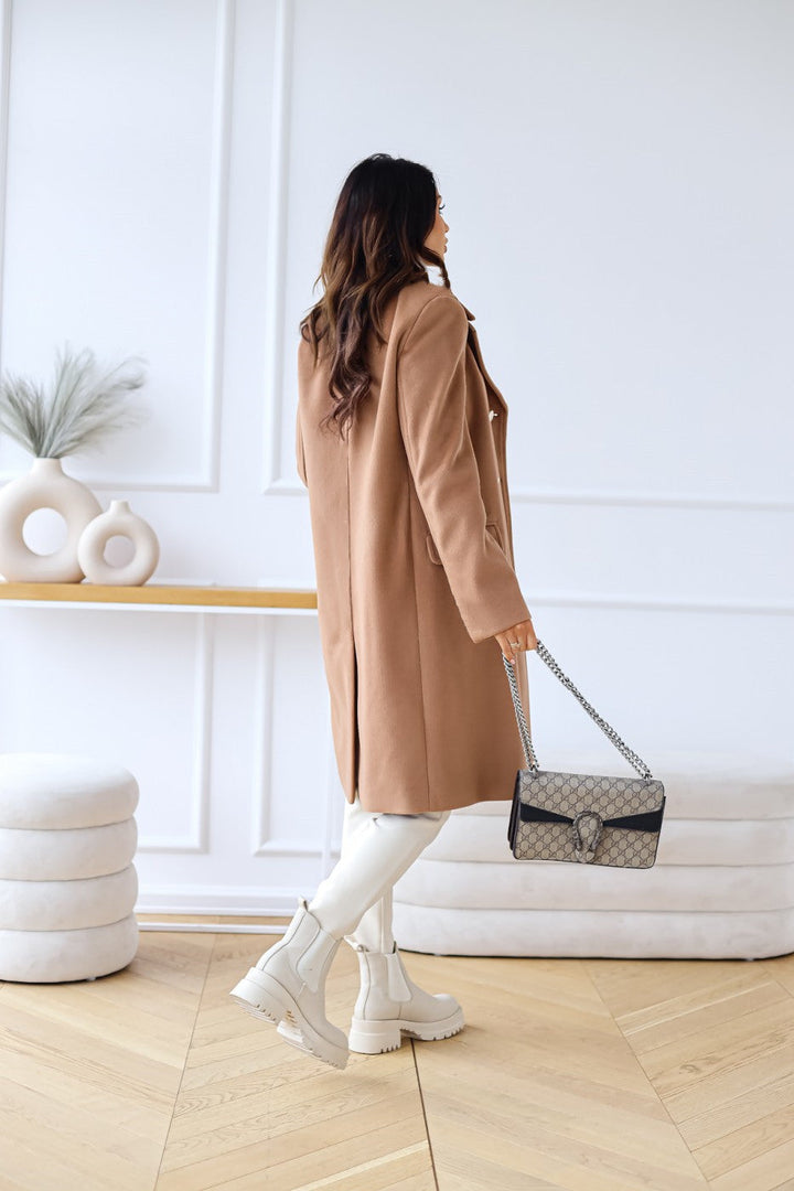 Ladies' classic double-breasted dress coat, elegant and perfect for cold weather.
