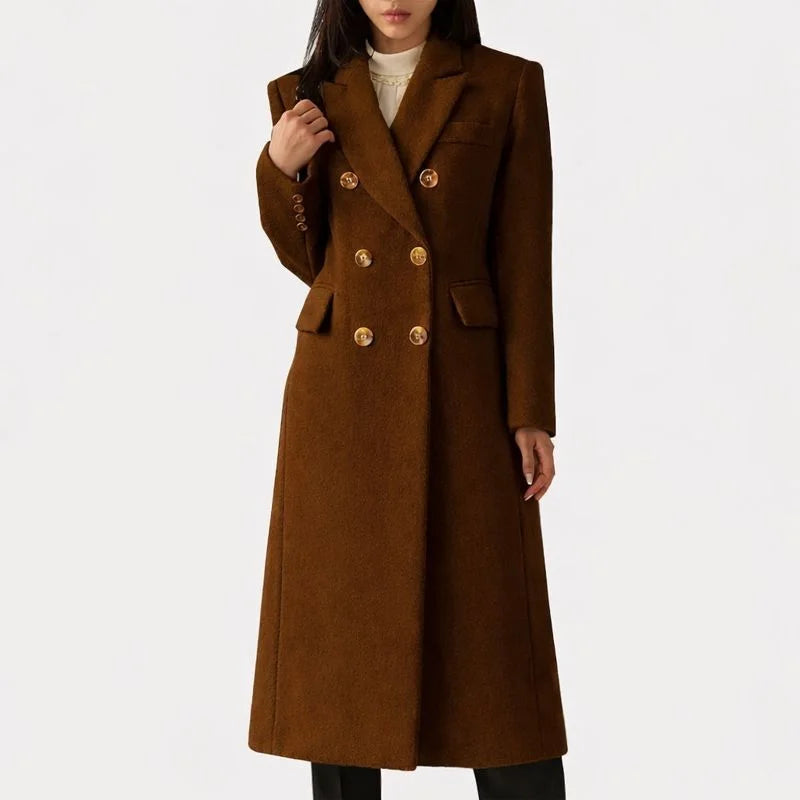 Sophisticated ladies double-breasted long trench jacket with notched lapel, a stylish choice for winter fashion.
